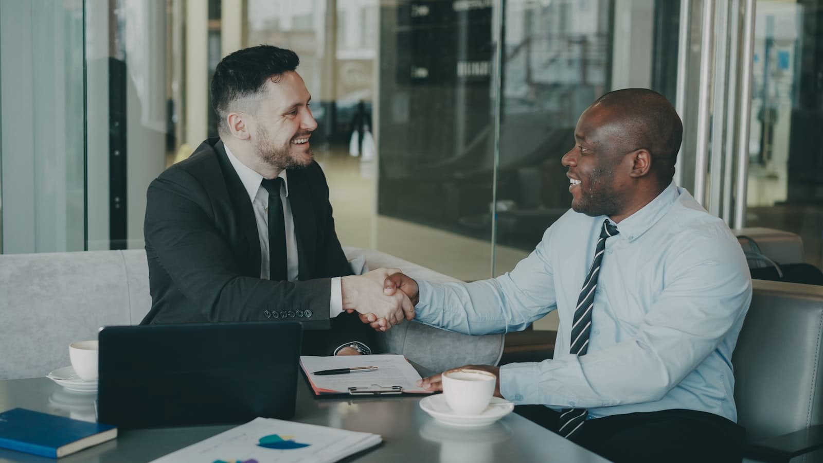 Business professionals shaking hands